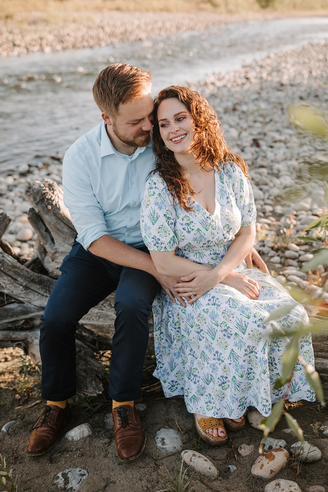 Zach and his wife Brennan by the river